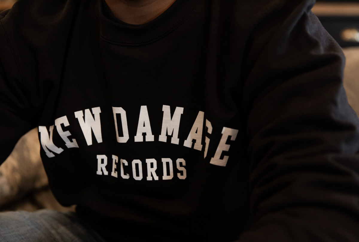 New Damage Champion Crewneck